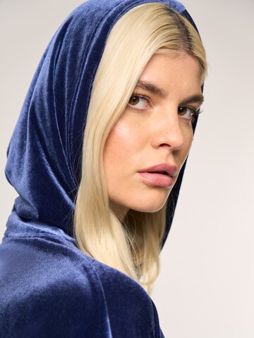 ABOUT YOU x Laura Giurcanu Sweatshirt 'Joyce' in Blue