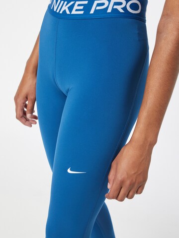 NIKE Skinny Sporthose in Blau