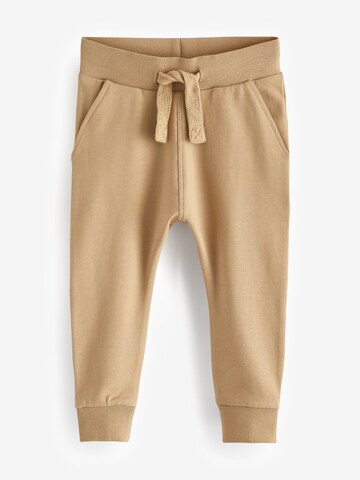Tapered Pantaloni di Next in colori misti