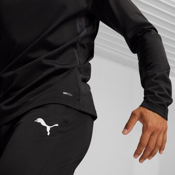 PUMA Slim fit Workout Pants 'Team Goal' in Black