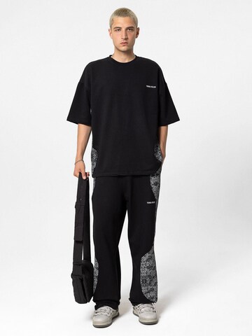 Loosefit Pantaloni 'Tropaeolum' di VAMOS CLO in nero