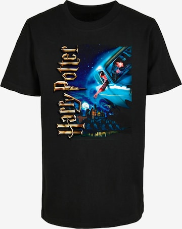ABSOLUTE CULT Shirt 'Harry Potter - Harry Smiles At Hogwarts' in Zwart: voorkant