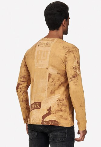 Rusty Neal Langarmshirt mit plakativem Front & Back Print in Braun