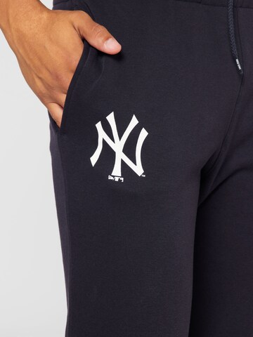 NEW ERA Tapered Pants in Blue