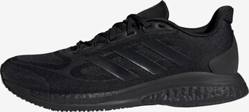 Chaussure de course 'Supernova' ADIDAS SPORTSWEAR en noir : devant