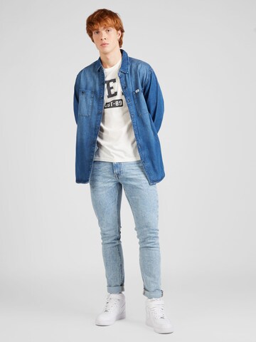 Coupe slim Jean 'Luke' Lee en bleu