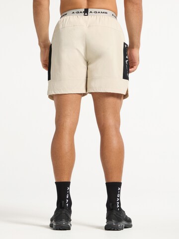 regular Pantaloni sportivi di A-Game in beige