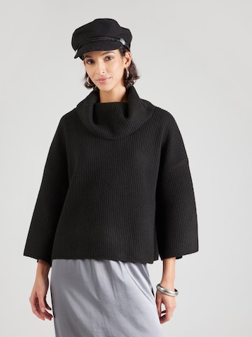 COMMA Tröja i svart: framsida