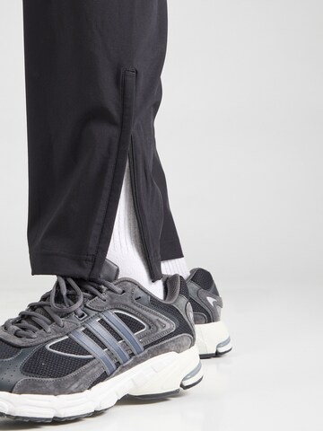 Tapered Pantaloni sport 'Tiro' de la ADIDAS SPORTSWEAR pe negru
