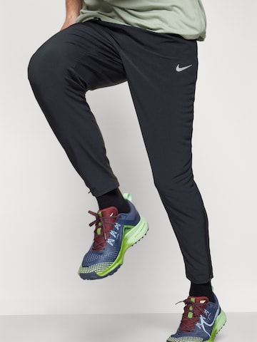 NIKE Tapered Workout Pants 'STRIDE' in Black
