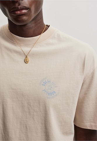 Pegador - Camiseta 'Nuevo' en beige