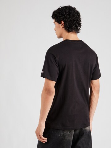 T-Shirt 'VARSITY TIGER' Tommy Jeans en noir