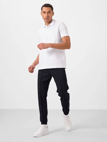 Tommy Life - Regular Calças de desporto 'Jogginghose' em preto