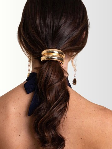 Ornement pour cheveux THE-ARE en or : devant