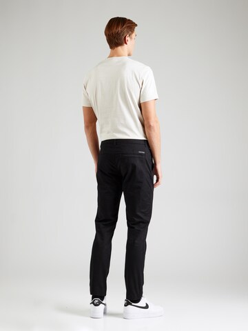 Tapered Pantaloni chino di Calvin Klein Jeans in nero