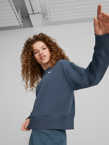 PUMA Bluzka sportowa w kolorze niebieski: przód