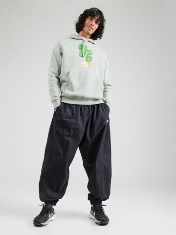 Nike Sportswear Дънки Tapered Leg Панталон 'CLUB' в черно