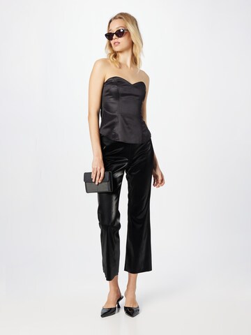 Evazați Pantaloni 'ALICE' de la GUESS pe negru