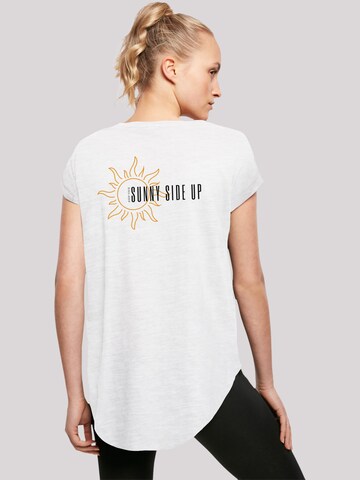 T-shirt 'Sunny side up' F4NT4STIC en blanc