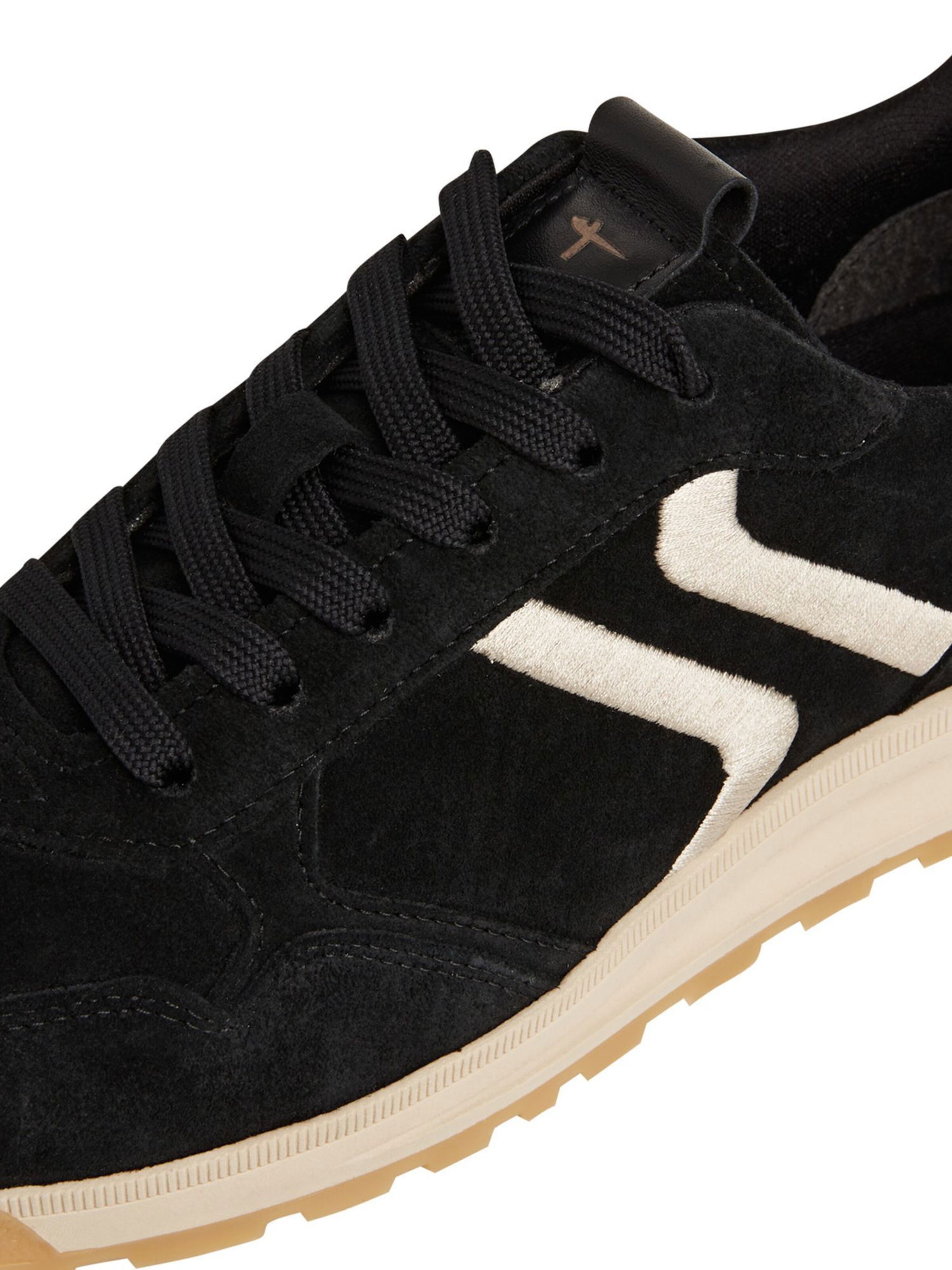 Baskets basses Tamaris en noir