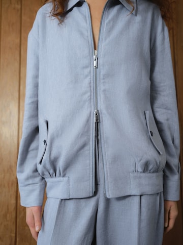 Next Tussenjas in Blauw