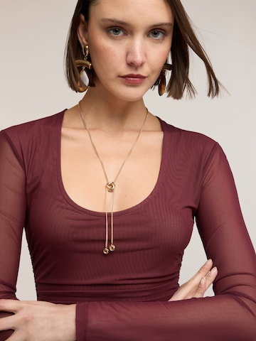 Haut MOTIVI en rouge