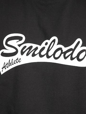 T-Shirt fonctionnel 'Macey' Smilodox en noir