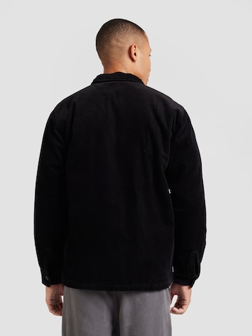 Carhartt WIP Kevad-sügisjope 'Whitsome', värv must