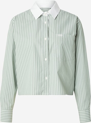 GUESS JEANS Bluzka w kolorze zielony: przód