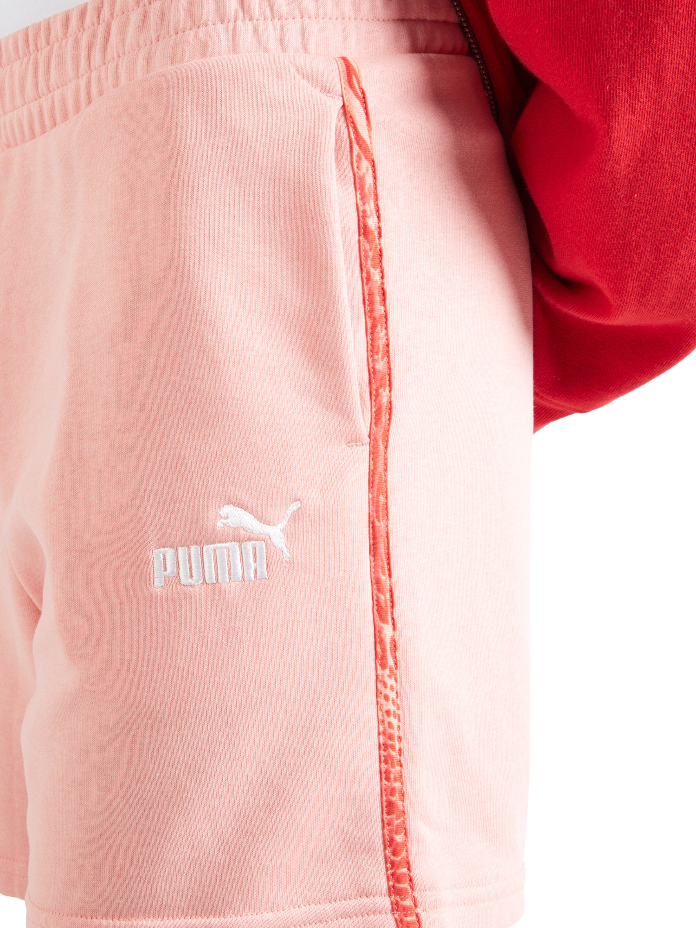 PUMA Lużny krój Spodnie sportowe 'ESS' w kolorze różowy