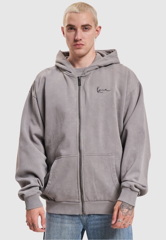 Veste de survêtement Karl Kani en gris : devant