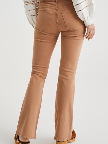 WE Fashion Boot cut Jeans in Brown