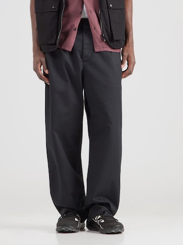 Carhartt WIP Bő szár Élére vasalt nadrágok 'Evan' - fekete: elől