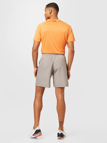 Regular Pantaloni sport de la UNDER ARMOUR pe bej