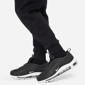 Nike Sportswear Tapered Pants 'Club' in Black