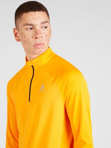 ODLO Sportshirt 'Essential Ceramiwarm' in Orange