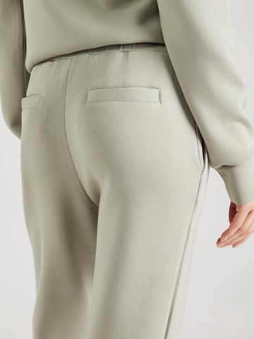 Varley Tapered Sporthose in Grün