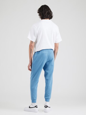 NIKE Tapered Workout Pants 'PRIMARY' in Blue