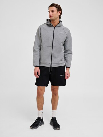Regular Pantalon 'Tech Fleece' Hummel en noir