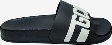 Claquettes / Tongs GCDS en noir : devant