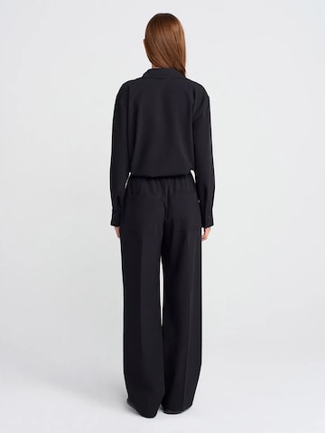 Dilvin Wide leg Trousers in Black