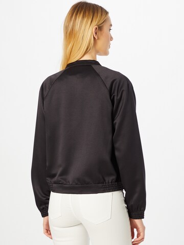 ABOUT YOU Between-Season Jacket 'Chani' in Black