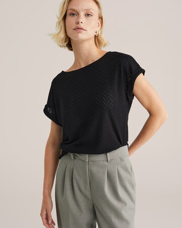 Tricou de la WE Fashion pe negru: față