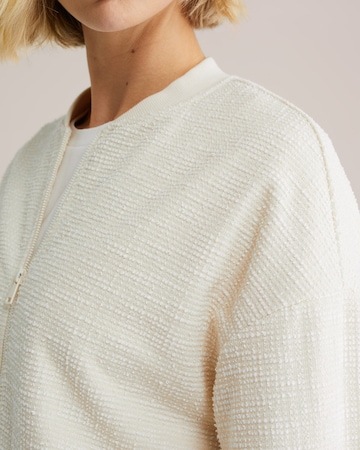 WE Fashion Prehodna jakna | bela barva