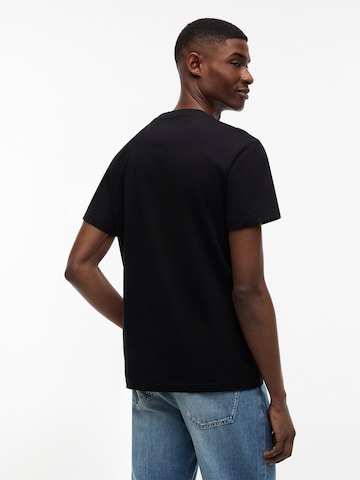 Tommy Jeans Paita 'ENTRY DNA' värissä musta