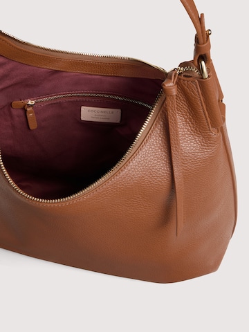 Coccinelle Handtas 'COCCINELLE REBEKKA 4' in Bruin