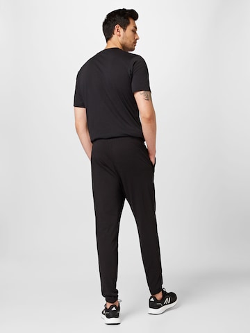 ADIDAS SPORTSWEAR Slimfit Παντελόνι φόρμας 'Essentials' σε μαύρο