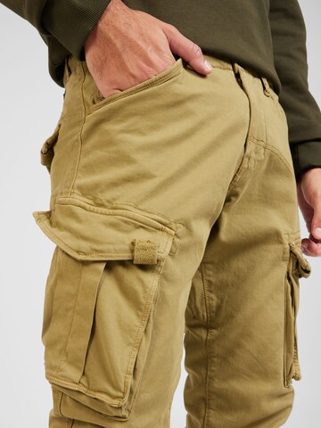 ALPHA INDUSTRIES Tapered Cargo nadrágok 'Spy' - zöld