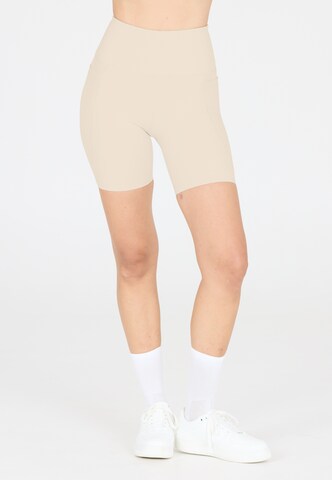 Athlecia Regular Workout Pants 'Aliya' in Beige: front