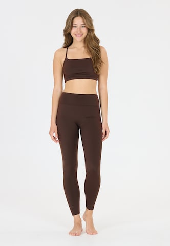 Athlecia Skinny Tights 'Blossom' in Braun